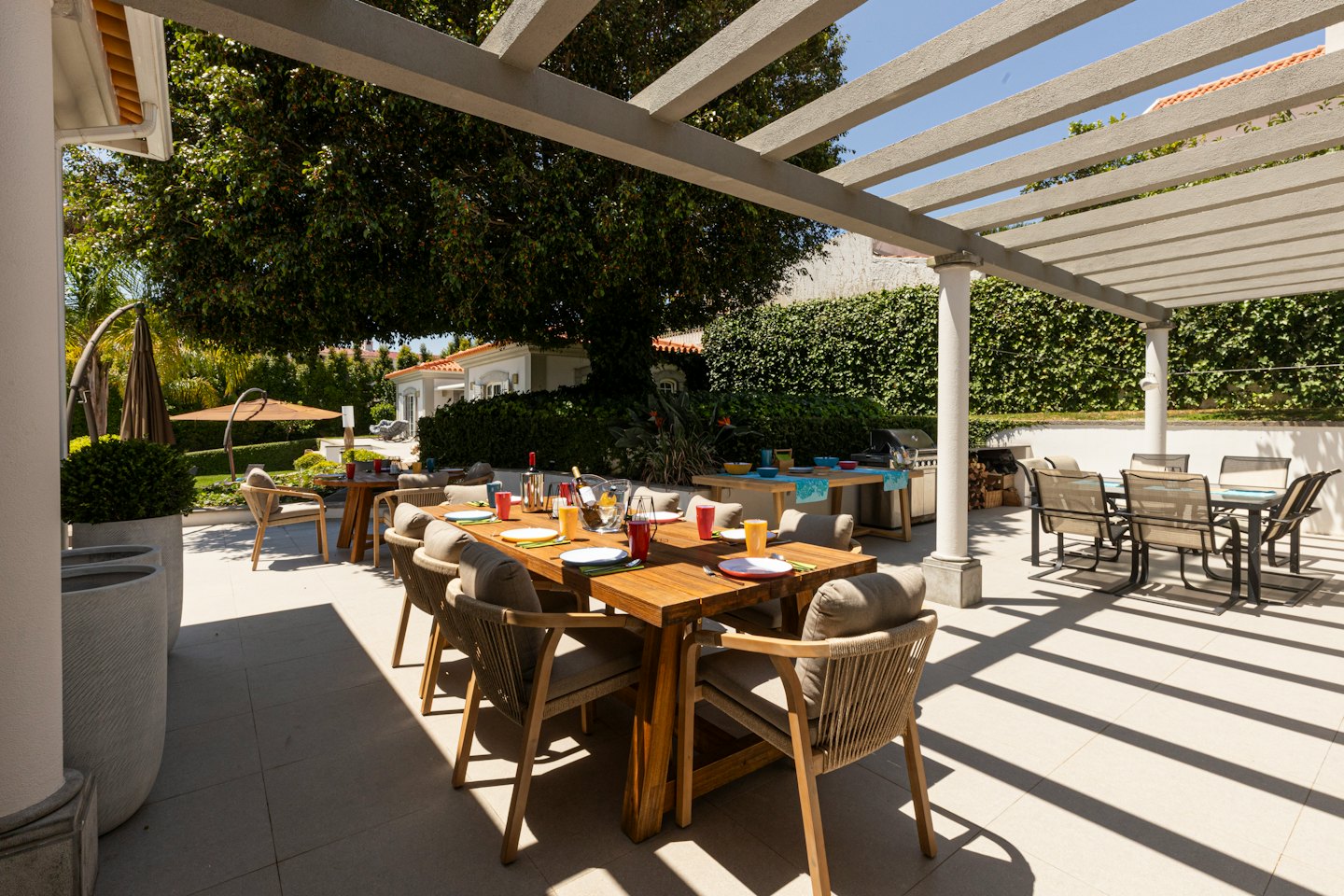 Spacious composite deck with outdoor dining table set for meals.
